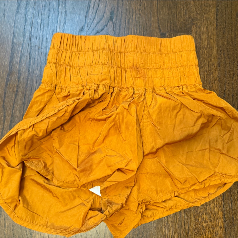 Free people Orange Smocked shorts